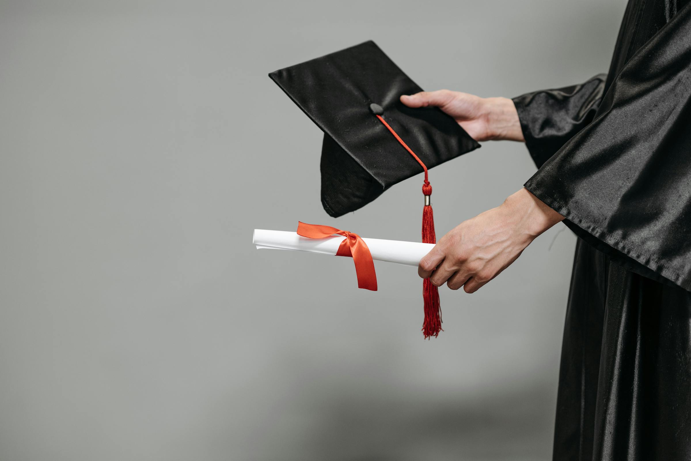 Diploma and graduation cap